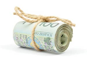 Roll of 100 PLN notes tied with a string